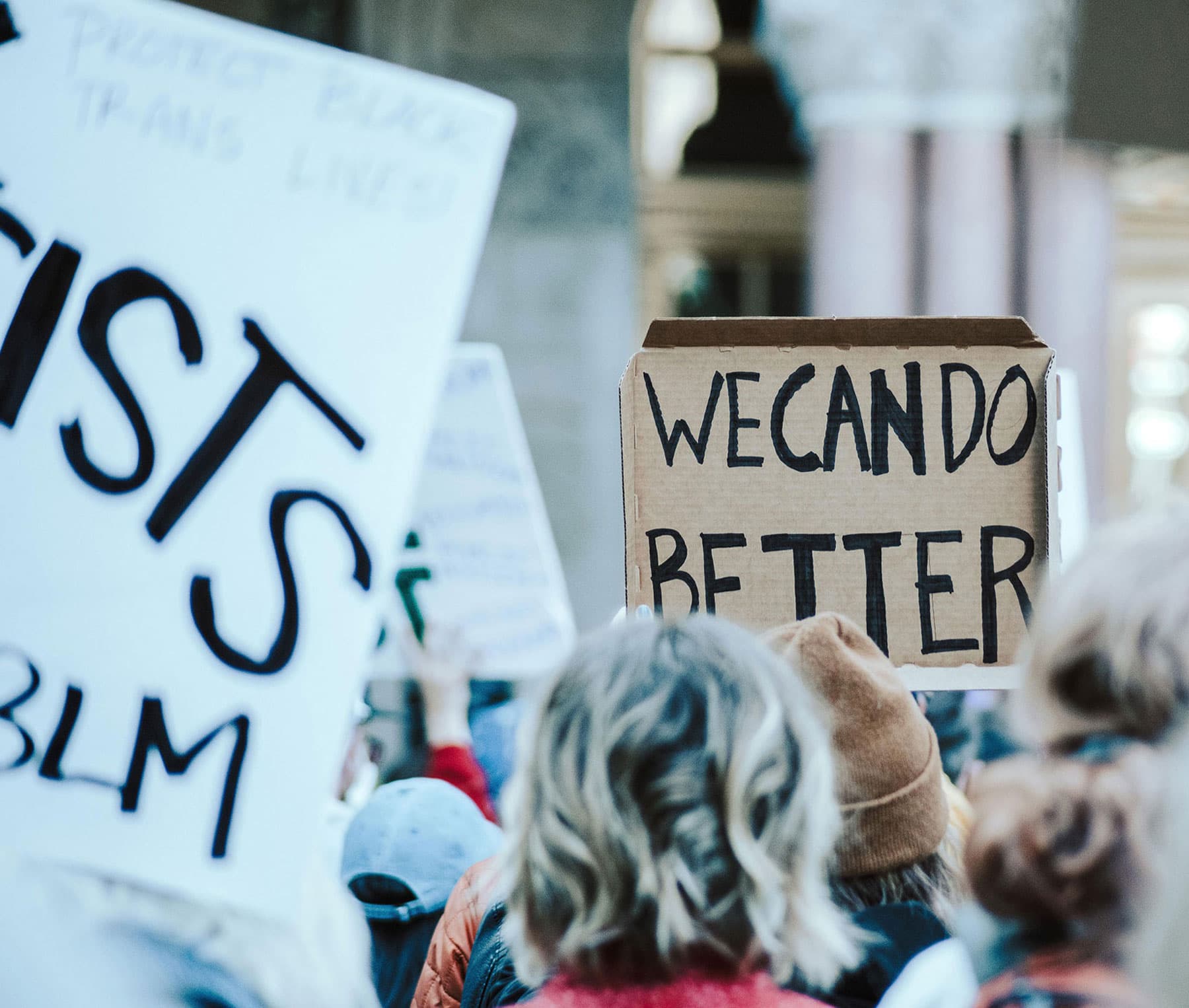 We Can Do Better — brand purpose protest signs